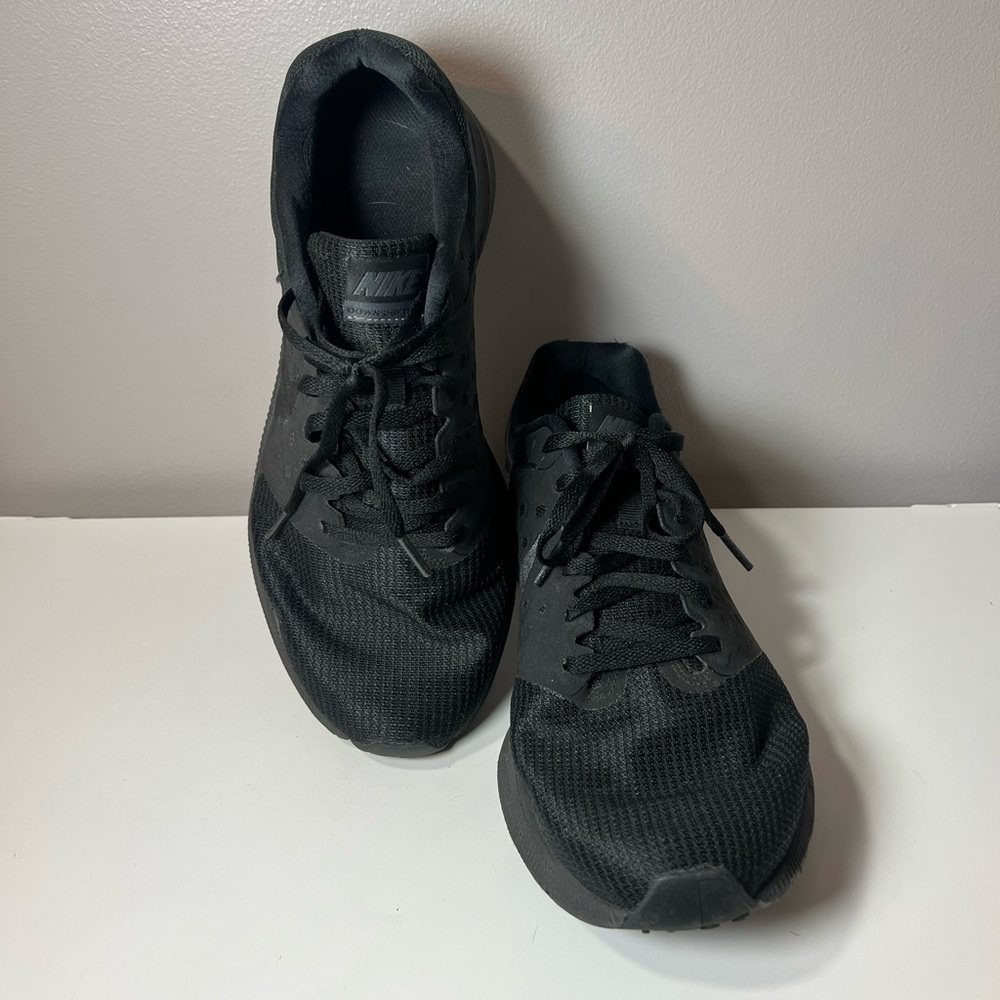 All black Nike Downshifter woman’s tennis shoes size 11